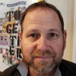 headshot of Tim Godfrey